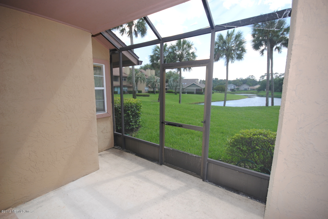605 Tournament Road Ponte Vedra Beach, FL 32082 - Photo 9 of 10 a view of a garden from a window