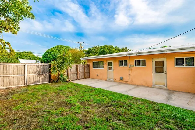 a view of a backyard with a garden