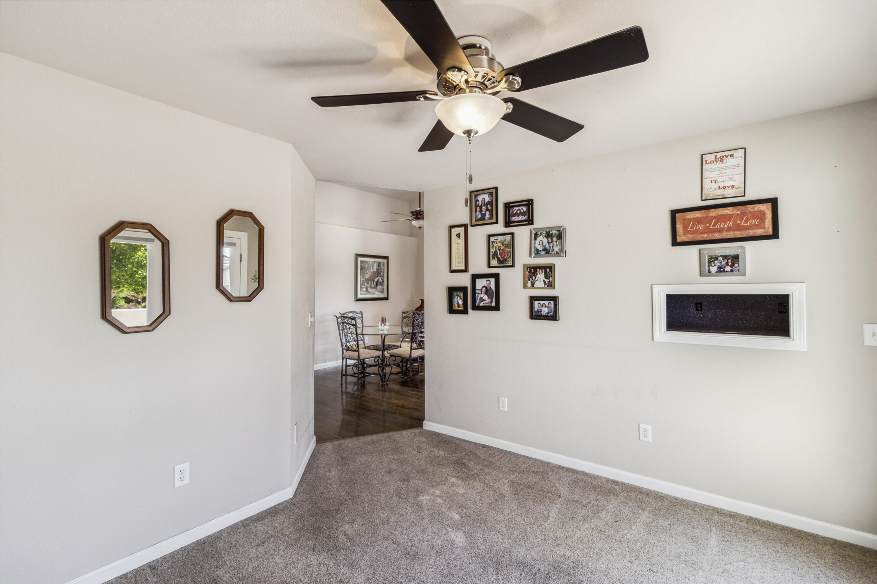 3884 Andes Drive Redding, CA 96001 - Photo 18 of 56 workspace with wooden floor and ceiling fan