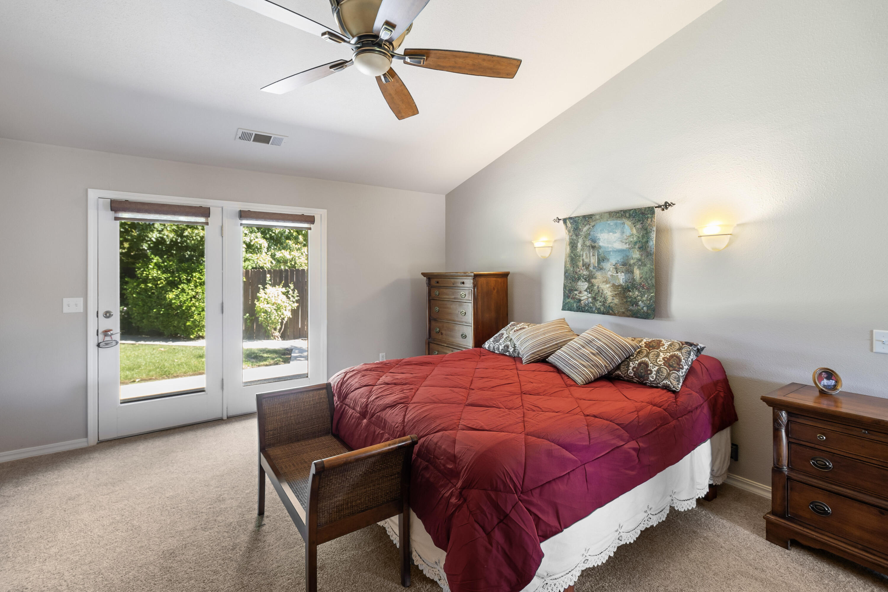 3884 Andes Drive Redding, CA 96001 - Photo 20 of 56 a bedroom with a large bed and a window