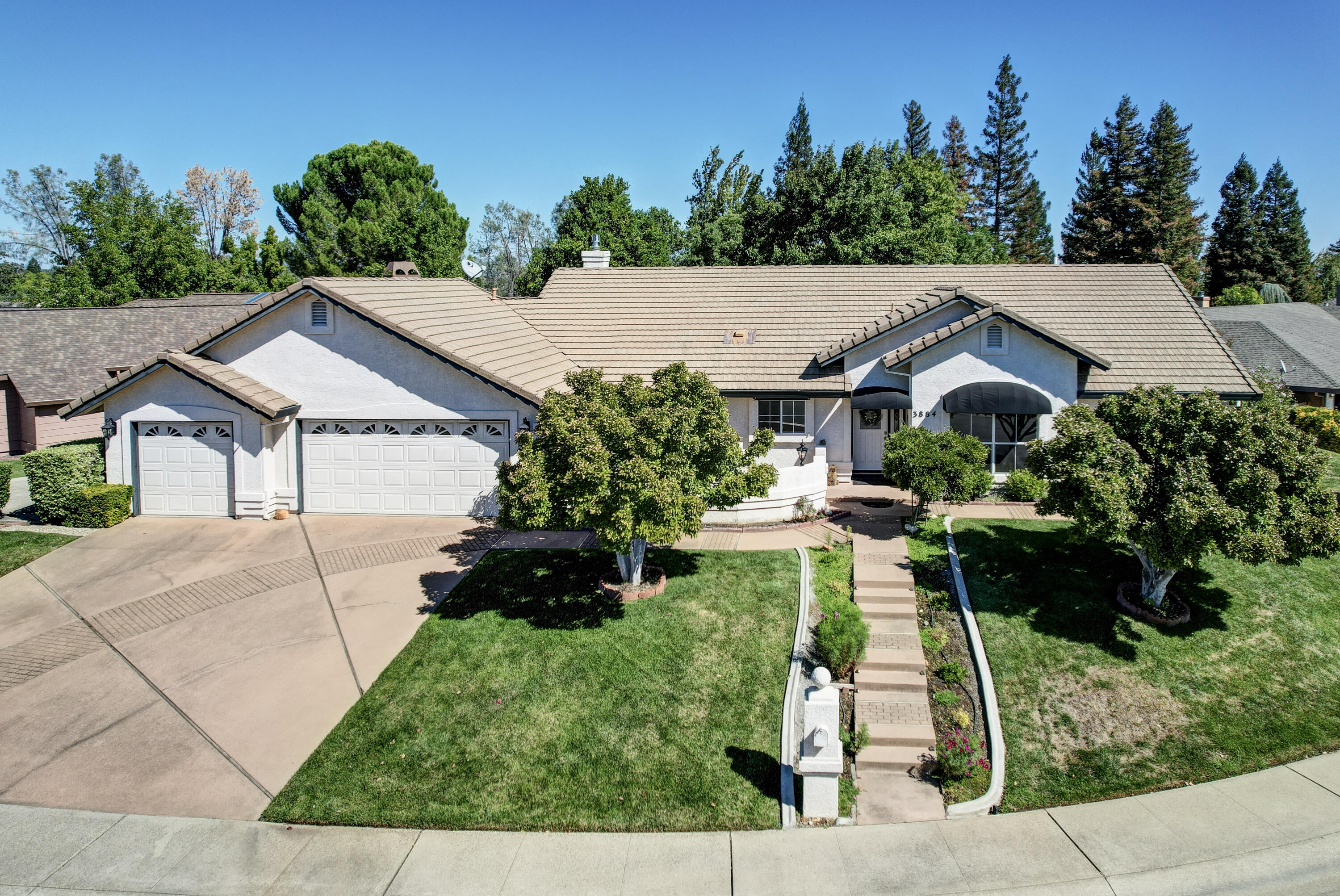 3884 Andes Drive Redding, CA 96001 - Photo 2 of 56 a aerial view of a house with a yard and a sitting area