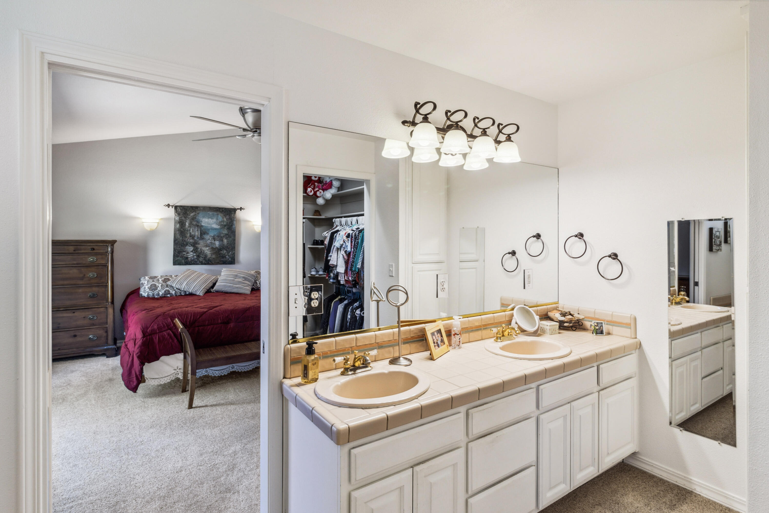 3884 Andes Drive Redding, CA 96001 - Photo 24 of 56 a bathroom with a sink double vanity and a mirror