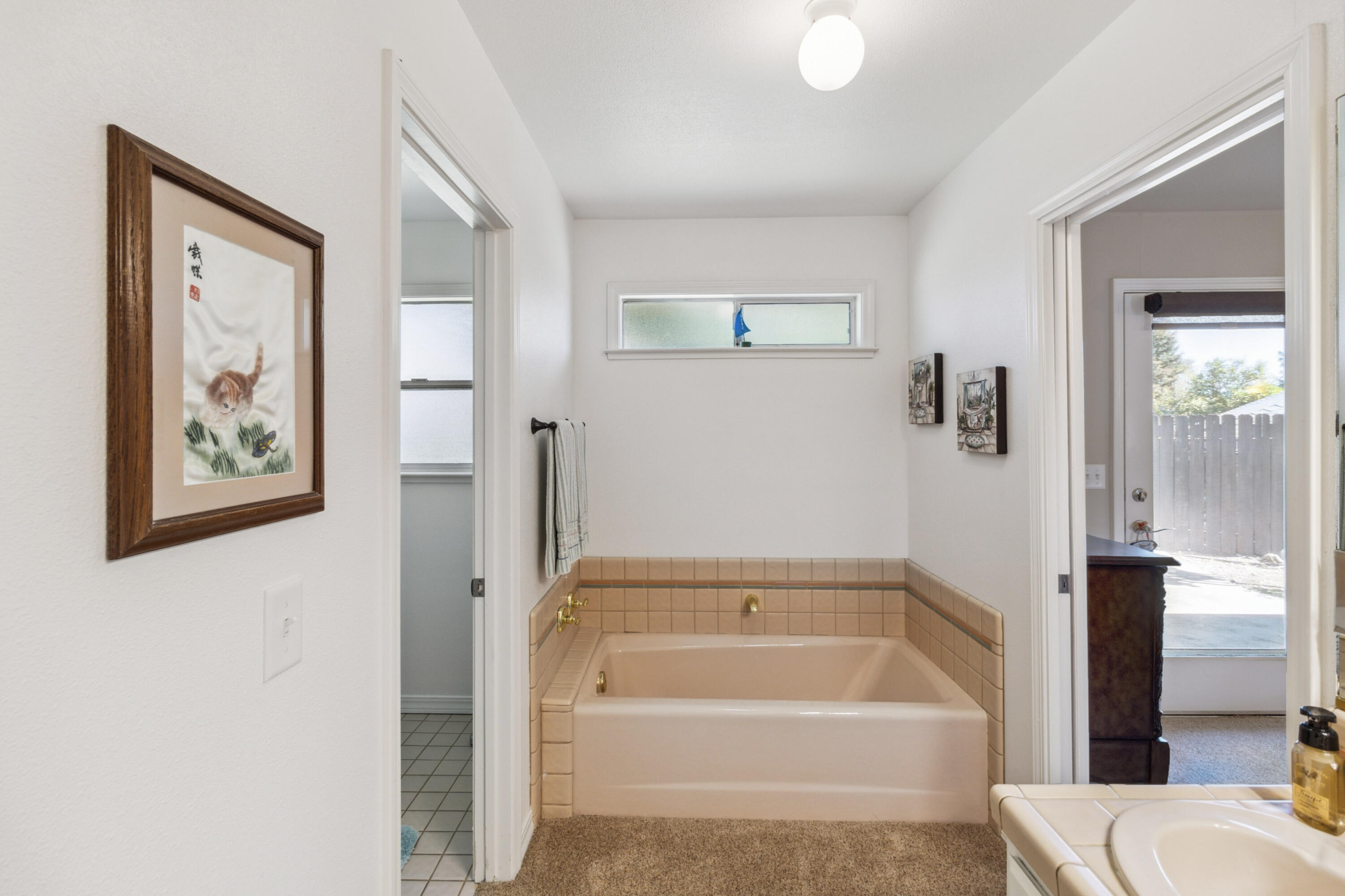 3884 Andes Drive Redding, CA 96001 - Photo 25 of 56 a bathroom with a tub and toilet