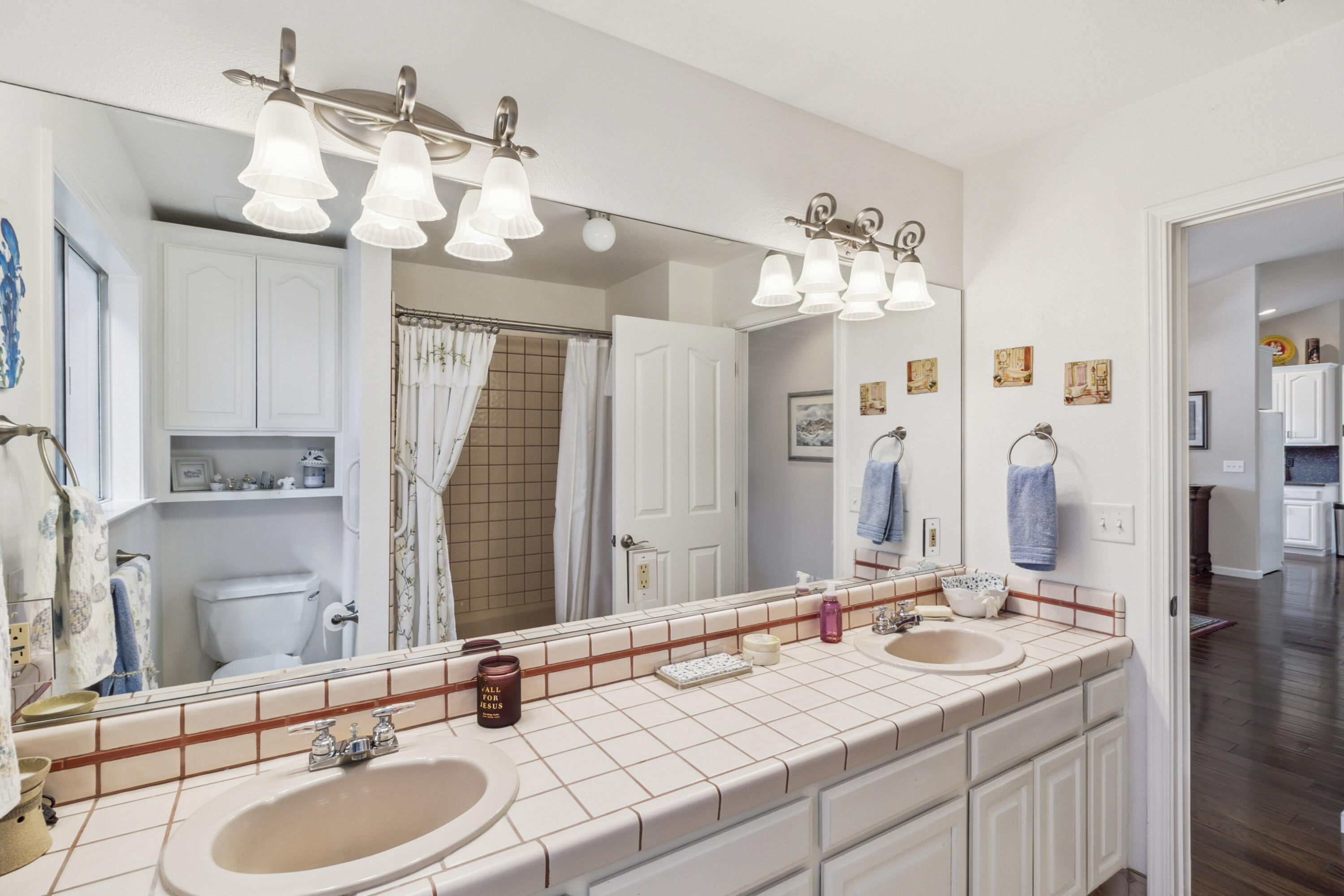 3884 Andes Drive Redding, CA 96001 - Photo 30 of 56 a bathroom with a sink double vanity and a mirror