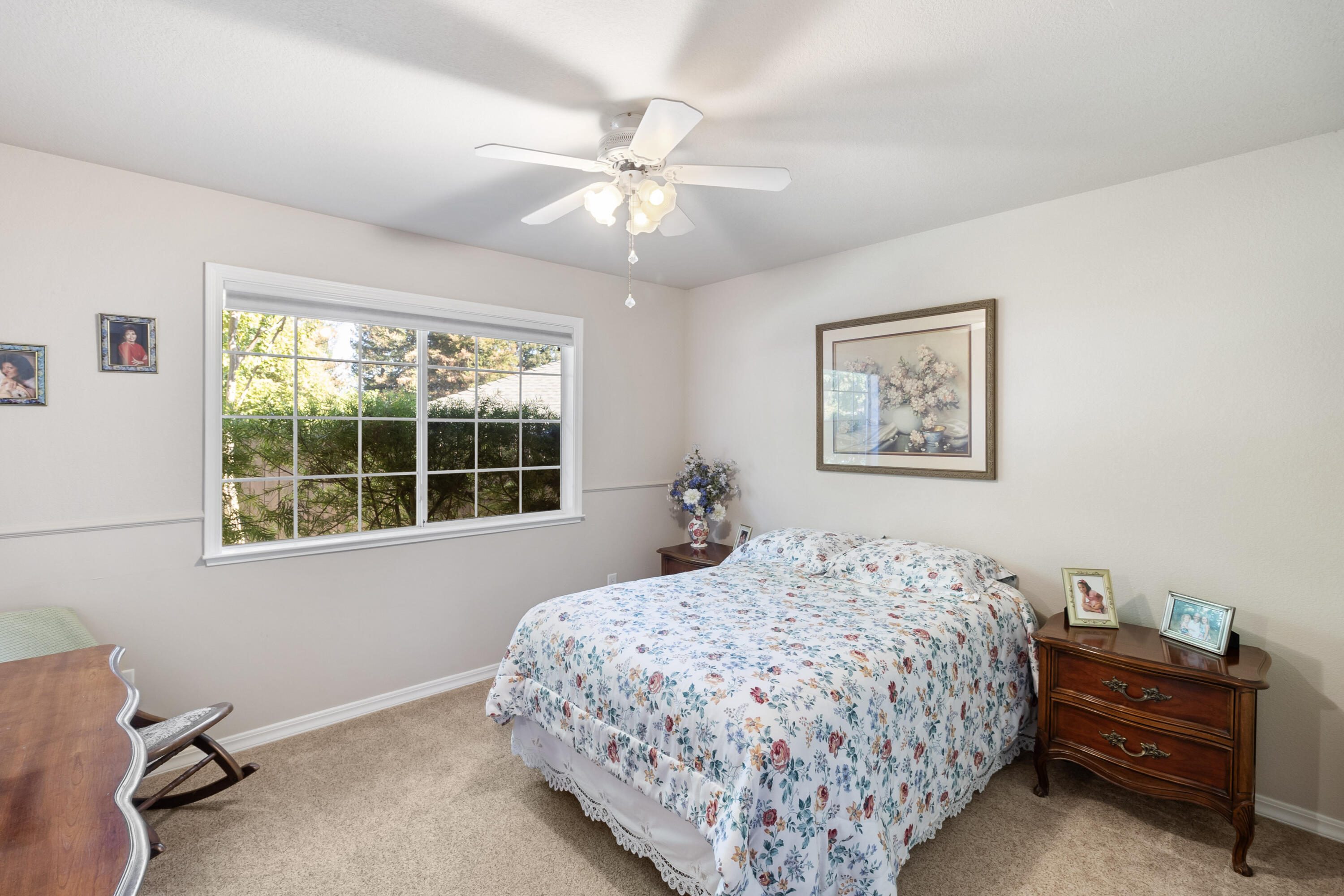 3884 Andes Drive Redding, CA 96001 - Photo 31 of 56 a bedroom with a bed and a window