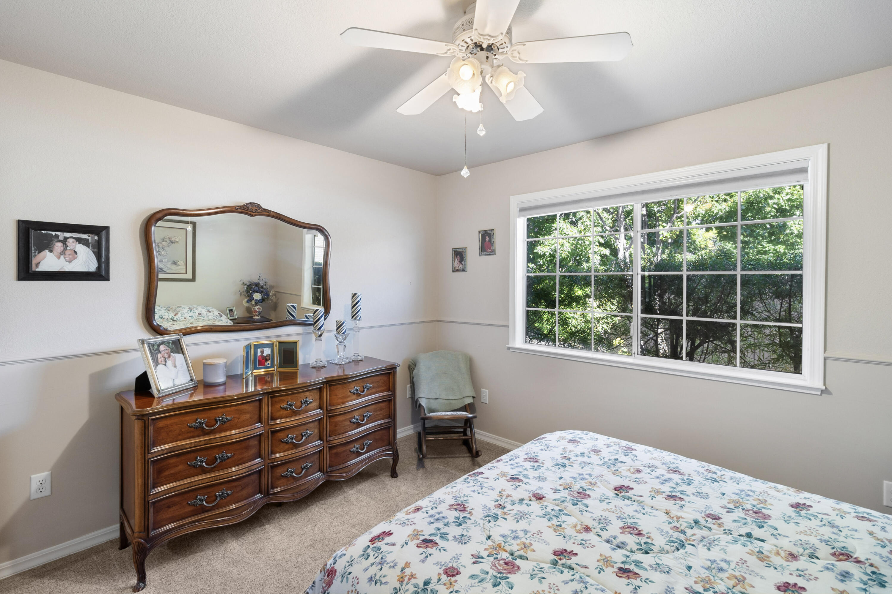 3884 Andes Drive Redding, CA 96001 - Photo 32 of 56 a bedroom with a bed and wooden floor