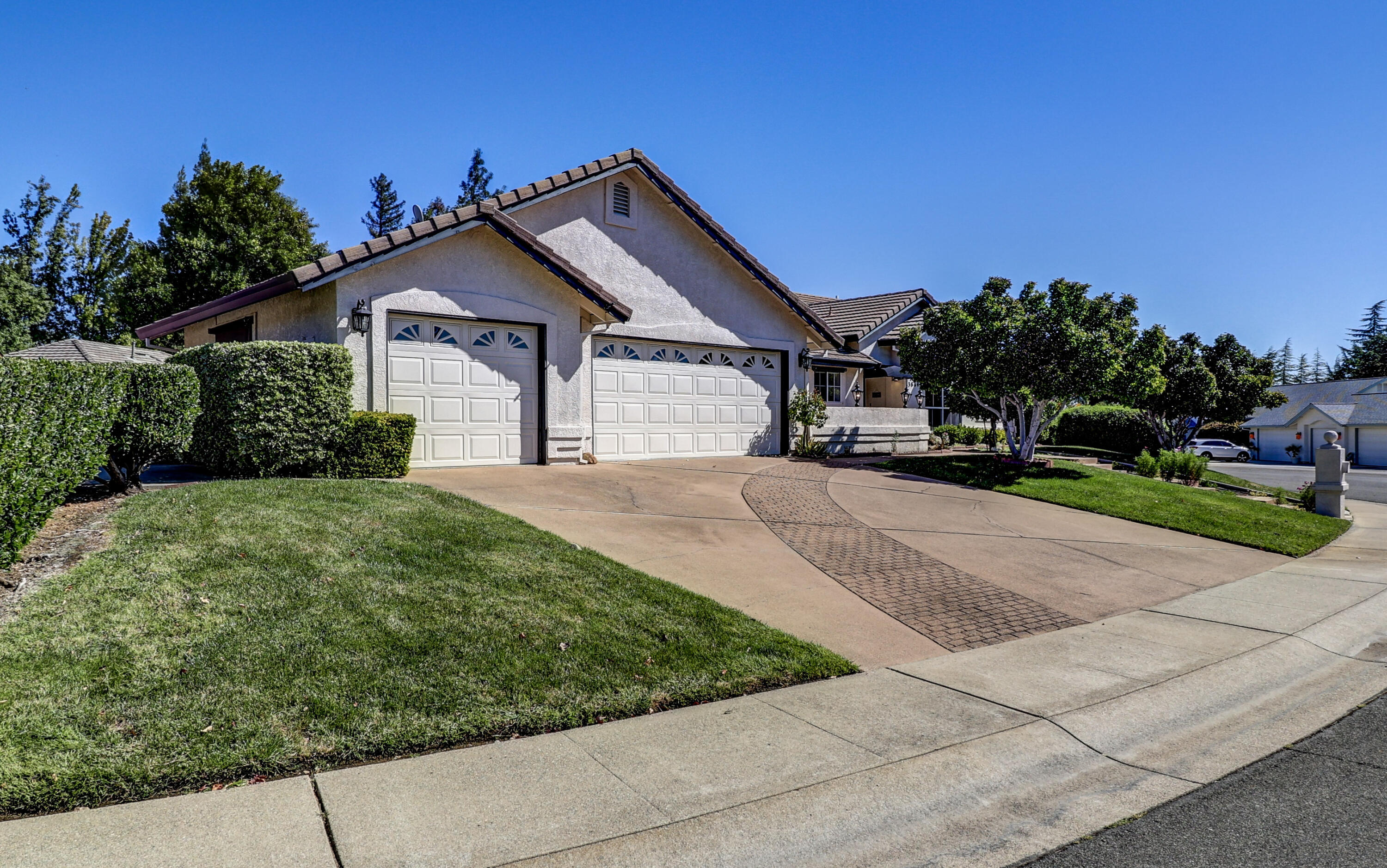 3884 Andes Drive Redding, CA 96001 - Photo 46 of 56 front view of a house with a yard