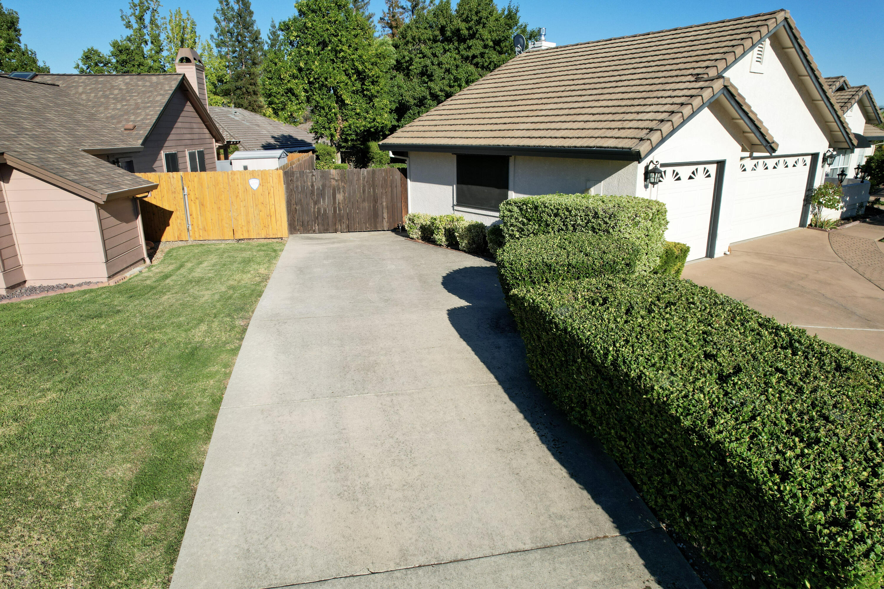 3884 Andes Drive Redding, CA 96001 - Photo 47 of 56 a house with green field in front of it