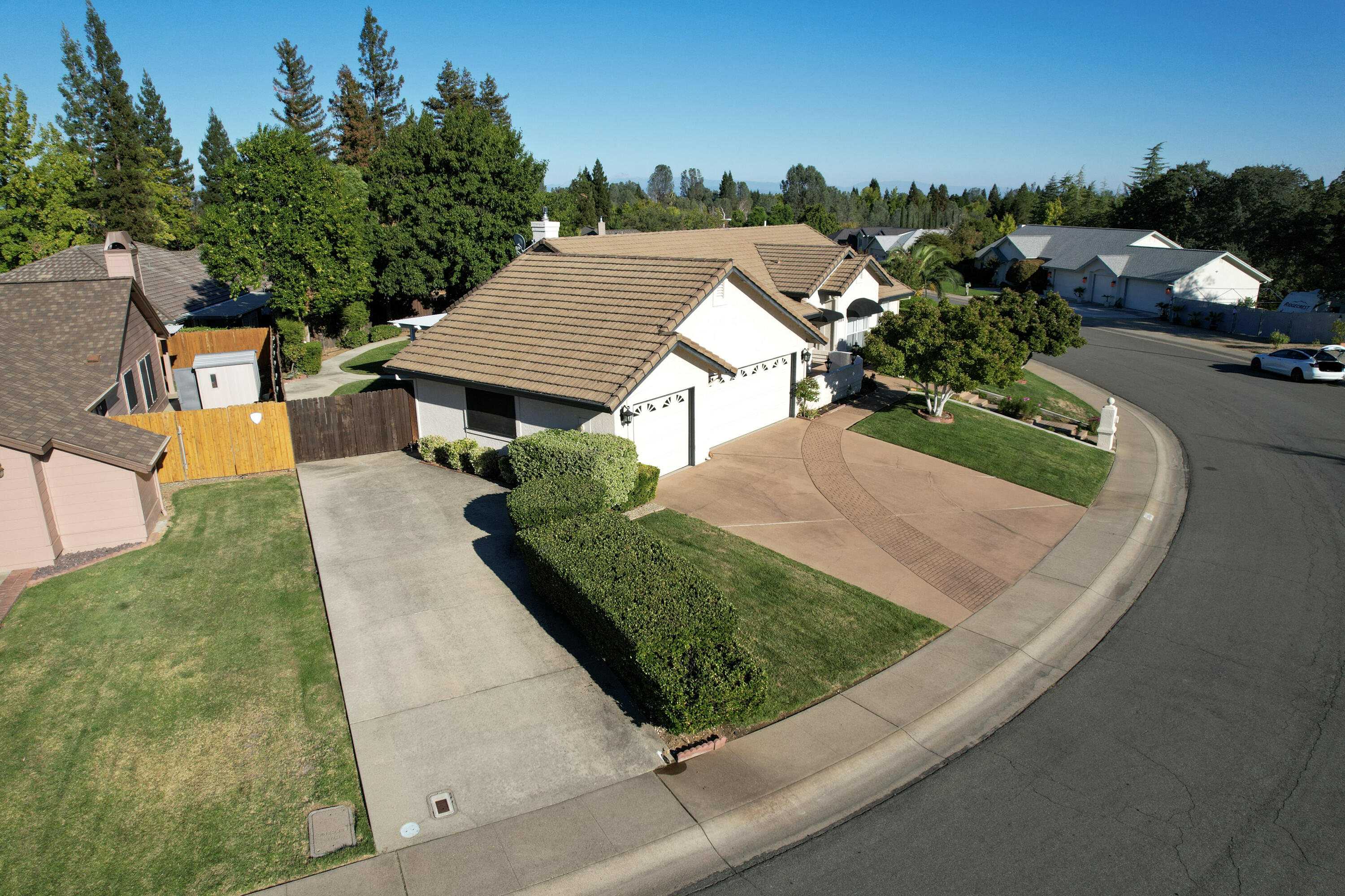 3884 Andes Drive Redding, CA 96001 - Photo 48 of 56 an aerial view of a house with a yard and trees