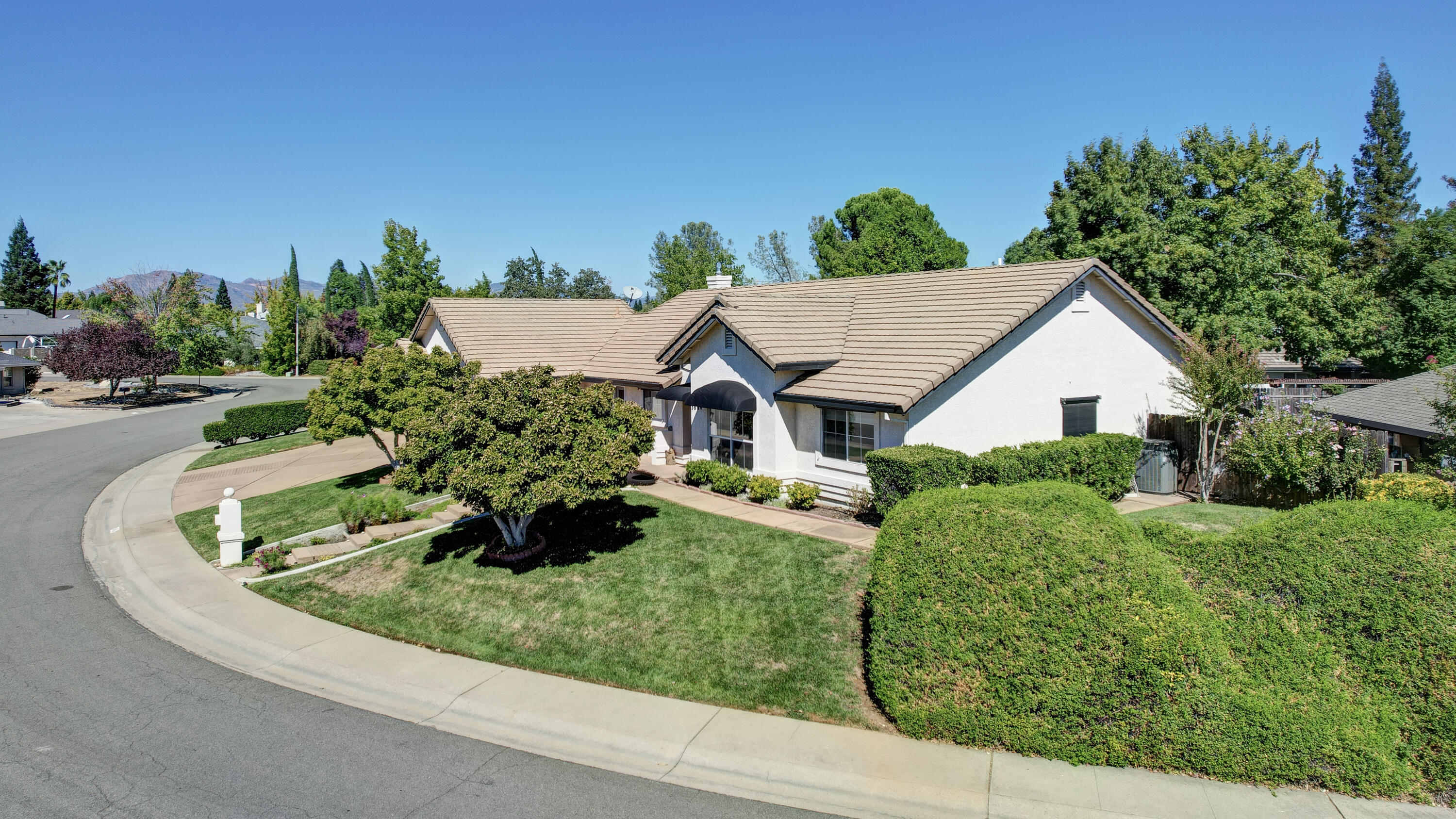 3884 Andes Drive Redding, CA 96001 - Photo 50 of 56 a aerial view of a house with yard and green space