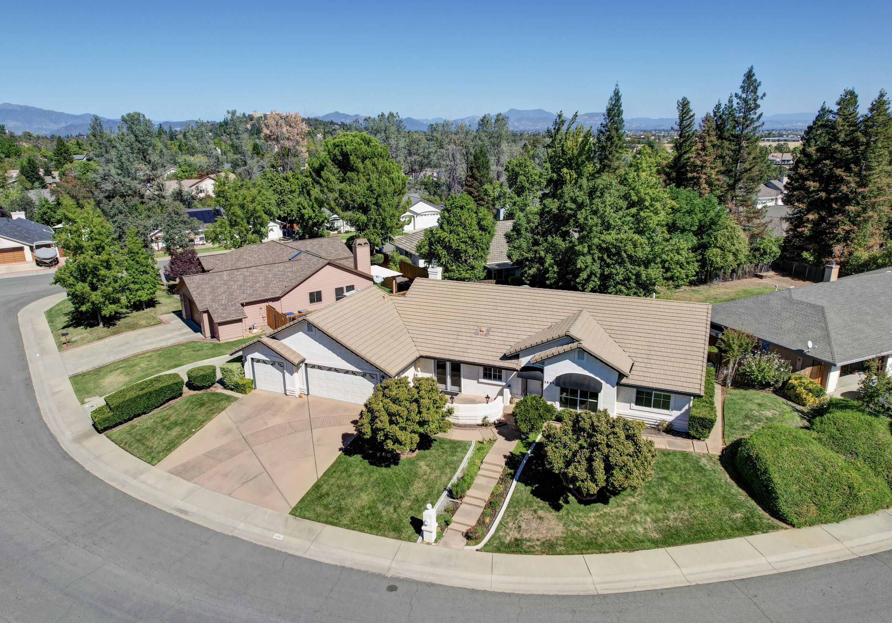 3884 Andes Drive Redding, CA 96001 - Photo 52 of 56 an aerial view of a house with a garden