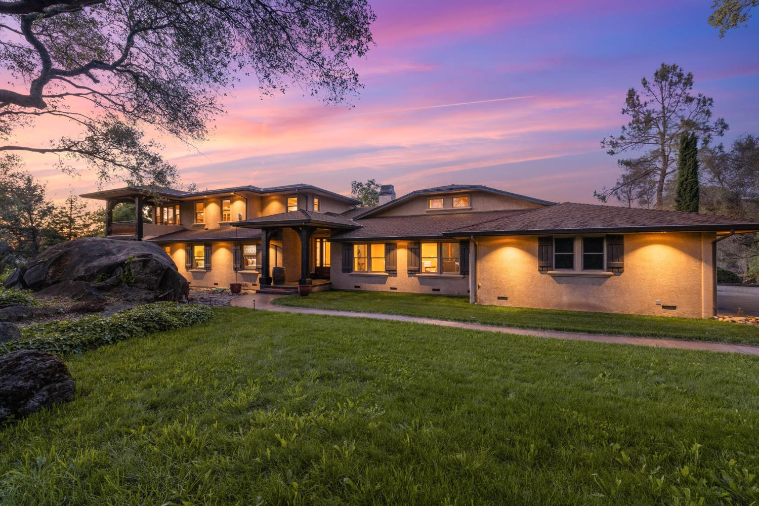 7021 Horseshoe Bar Road Loomis, CA 95650 - Photo 4 of 77 a front view of a house with a yard