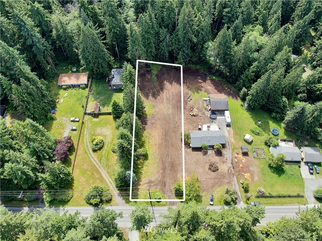 5105 East Harbor Road Freeland, WA 98249 - Photo 17 of 30 an aerial view of residential house with outdoor space and trees all around