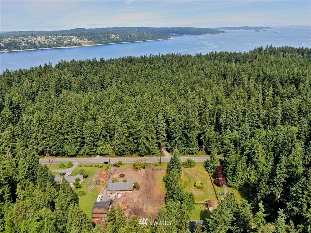 5105 East Harbor Road Freeland, WA 98249 - Photo 21 of 30 a view of a lake with a city view