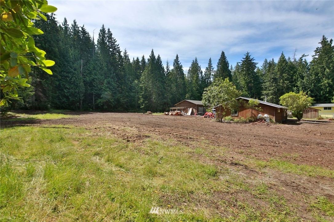 5105 East Harbor Road Freeland, WA 98249 - Photo 7 of 30 a view of outdoor space with playground and green space