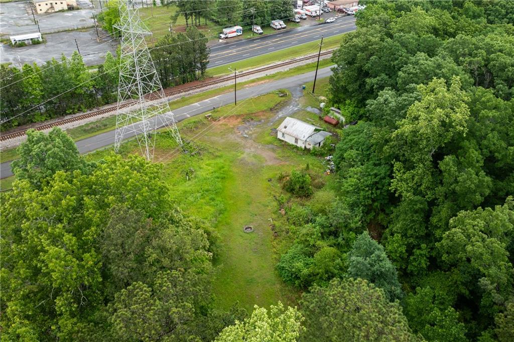 4410 Stacks Road Atlanta, GA 30349 - Photo 4 of 10 a view of a backyard with plants and outdoor seating