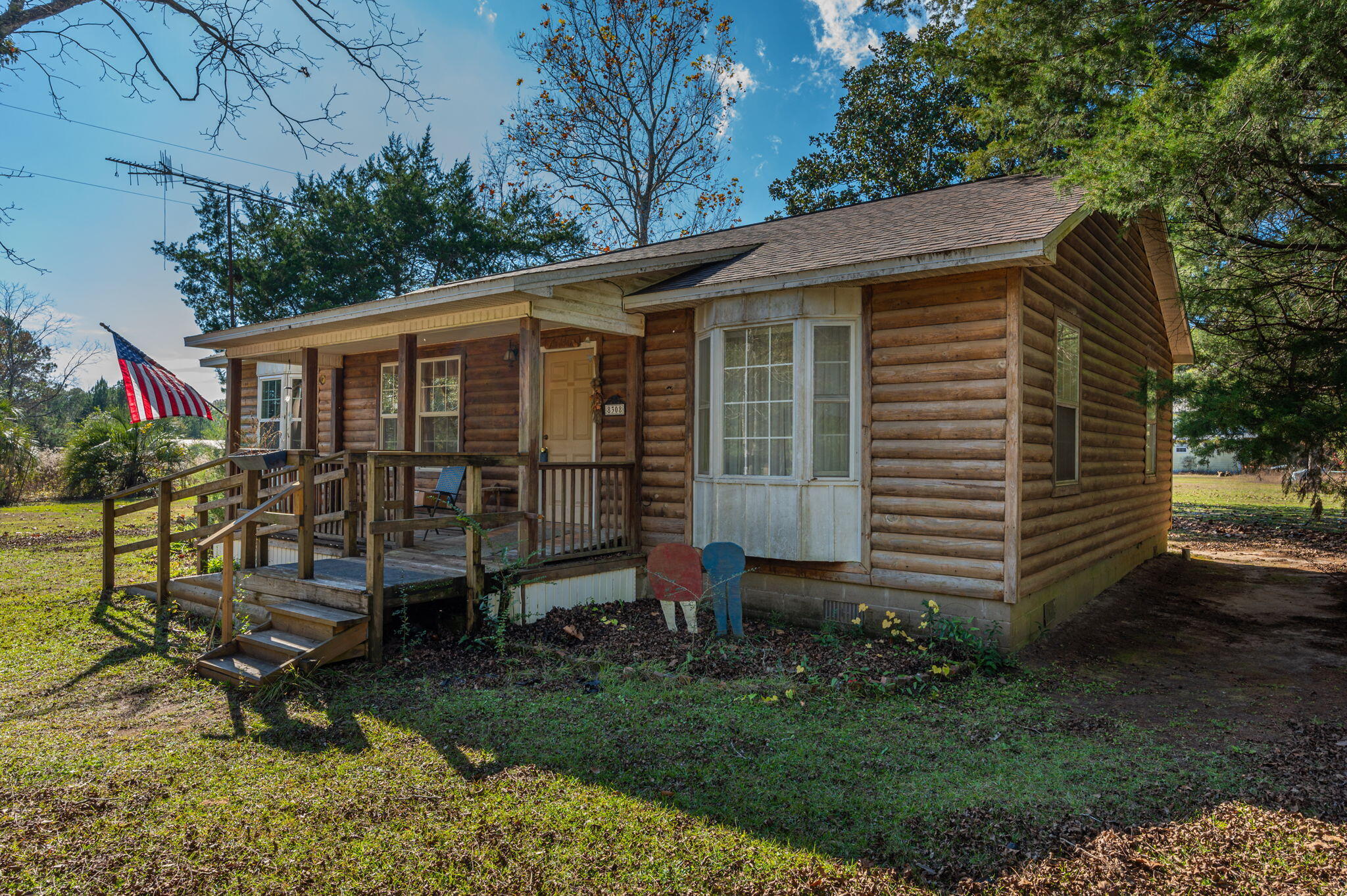 8308 Stokes Road Laurel Hill, FL 32567 - Photo 3 of 27 a view of a house with a yard