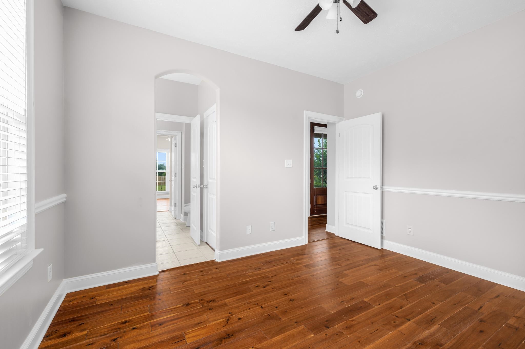 33 Ward Lane Atoka, TN 38004 - Photo 14 of 29 an empty room with fan and windows