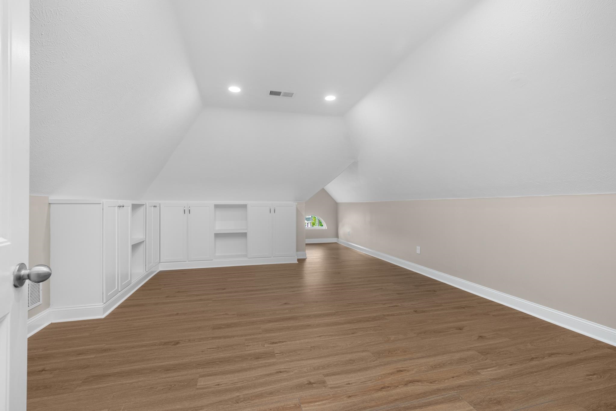 33 Ward Lane Atoka, TN 38004 - Photo 18 of 29 a view of empty room with wooden floor