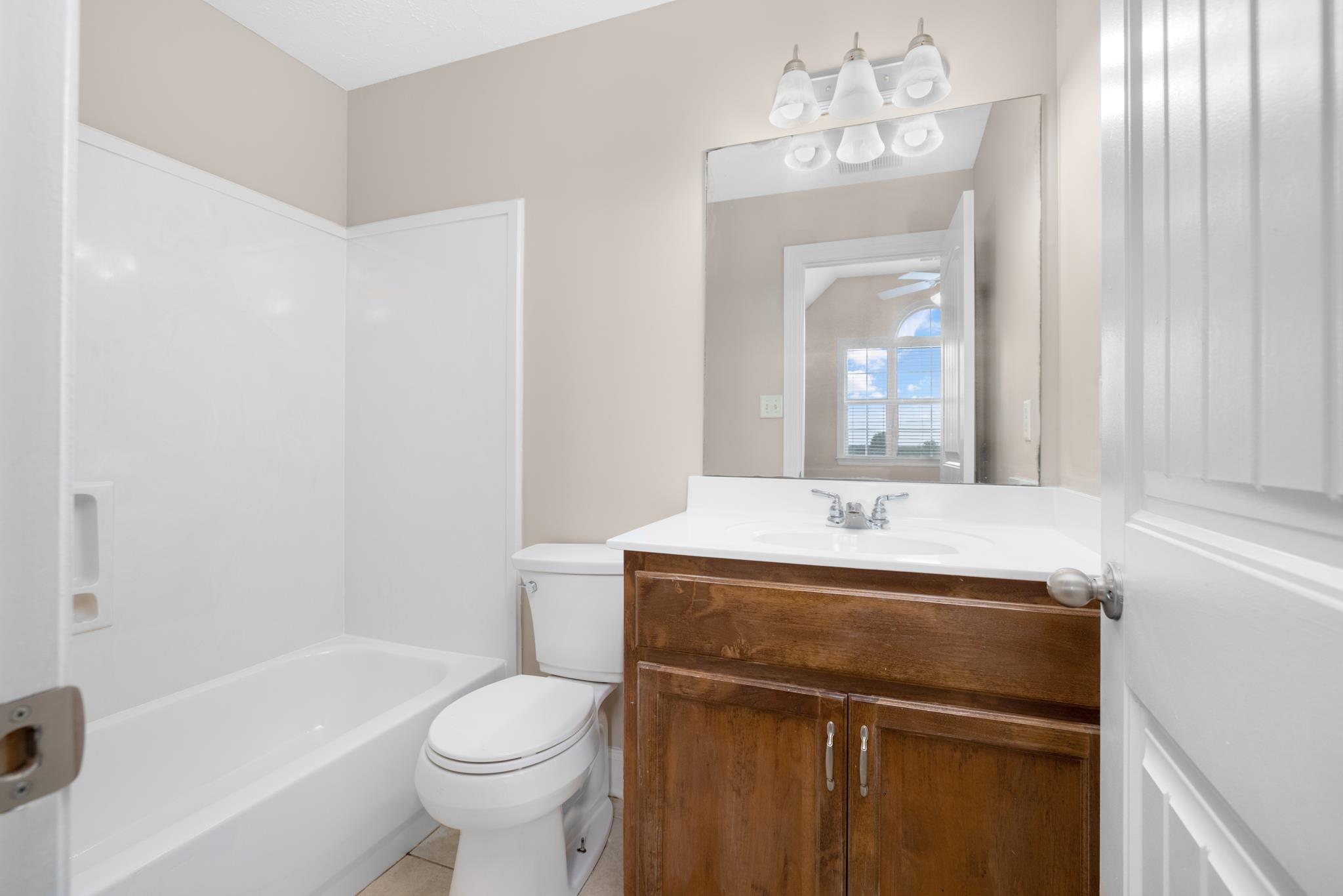 33 Ward Lane Atoka, TN 38004 - Photo 21 of 29 a bathroom with a sink a toilet and shower