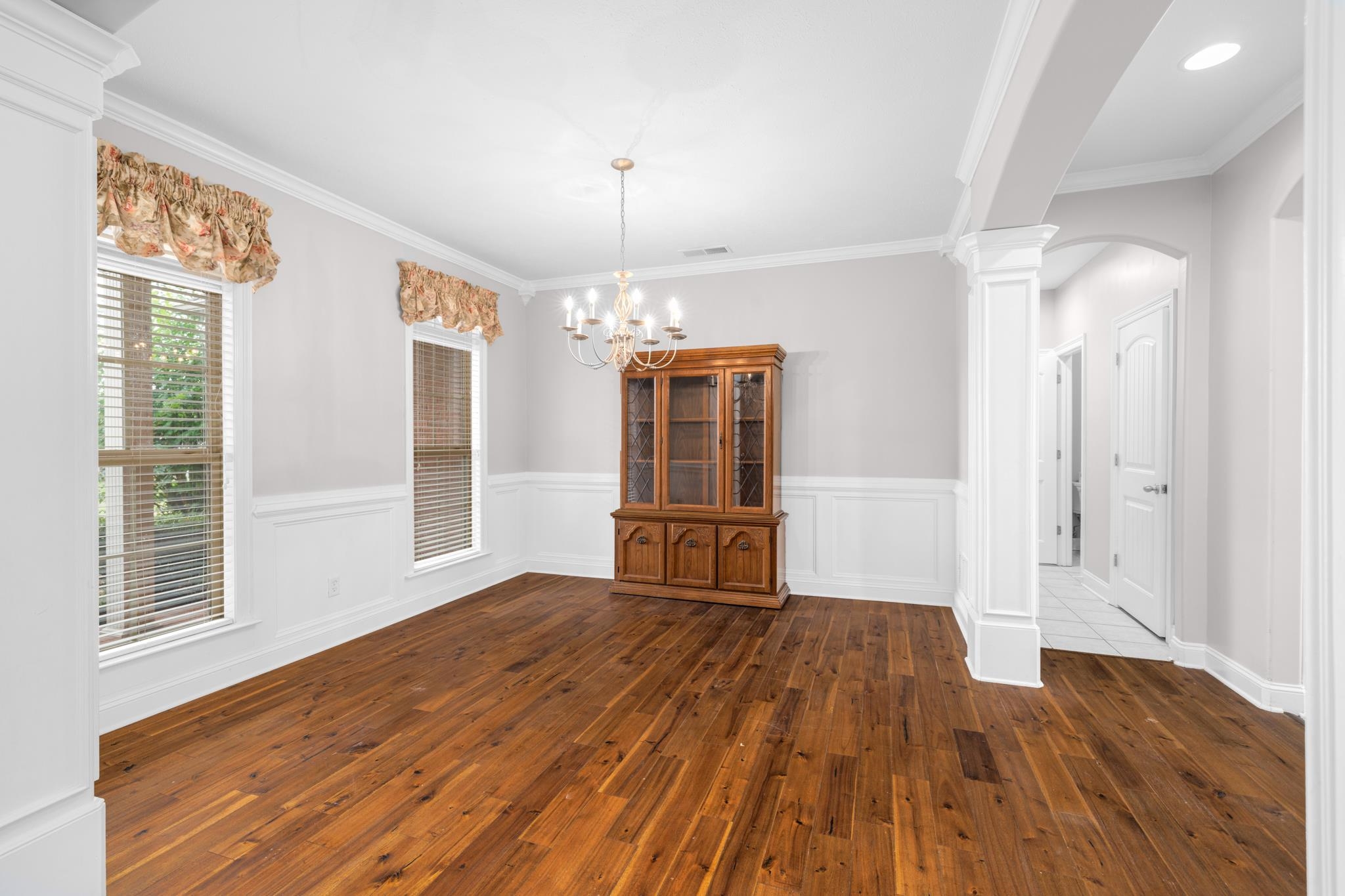 33 Ward Lane Atoka, TN 38004 - Photo 4 of 29 a view of empty room with wooden floor and fan