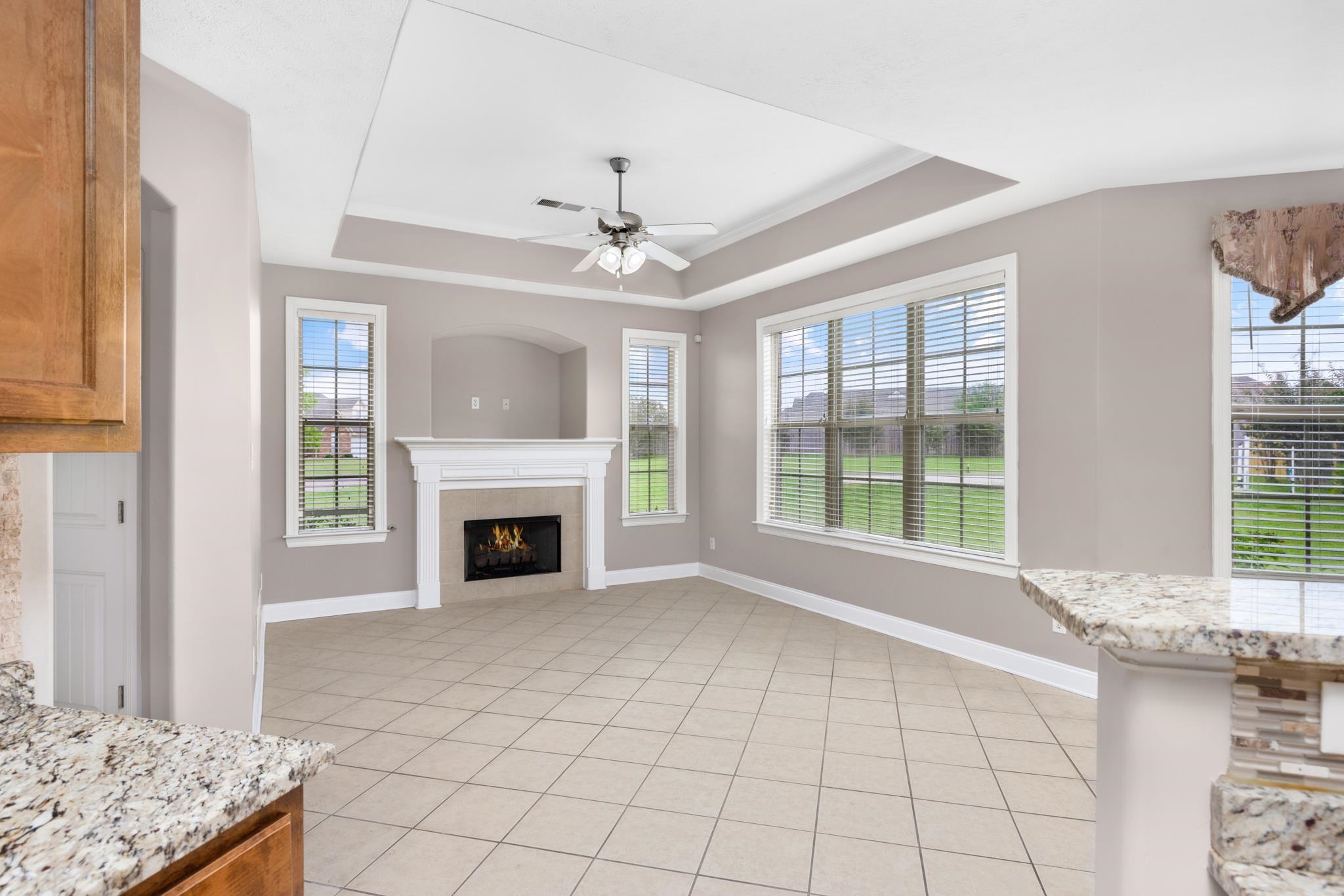 33 Ward Lane Atoka, TN 38004 - Photo 5 of 29 a view of an empty room with window and chandelier fan