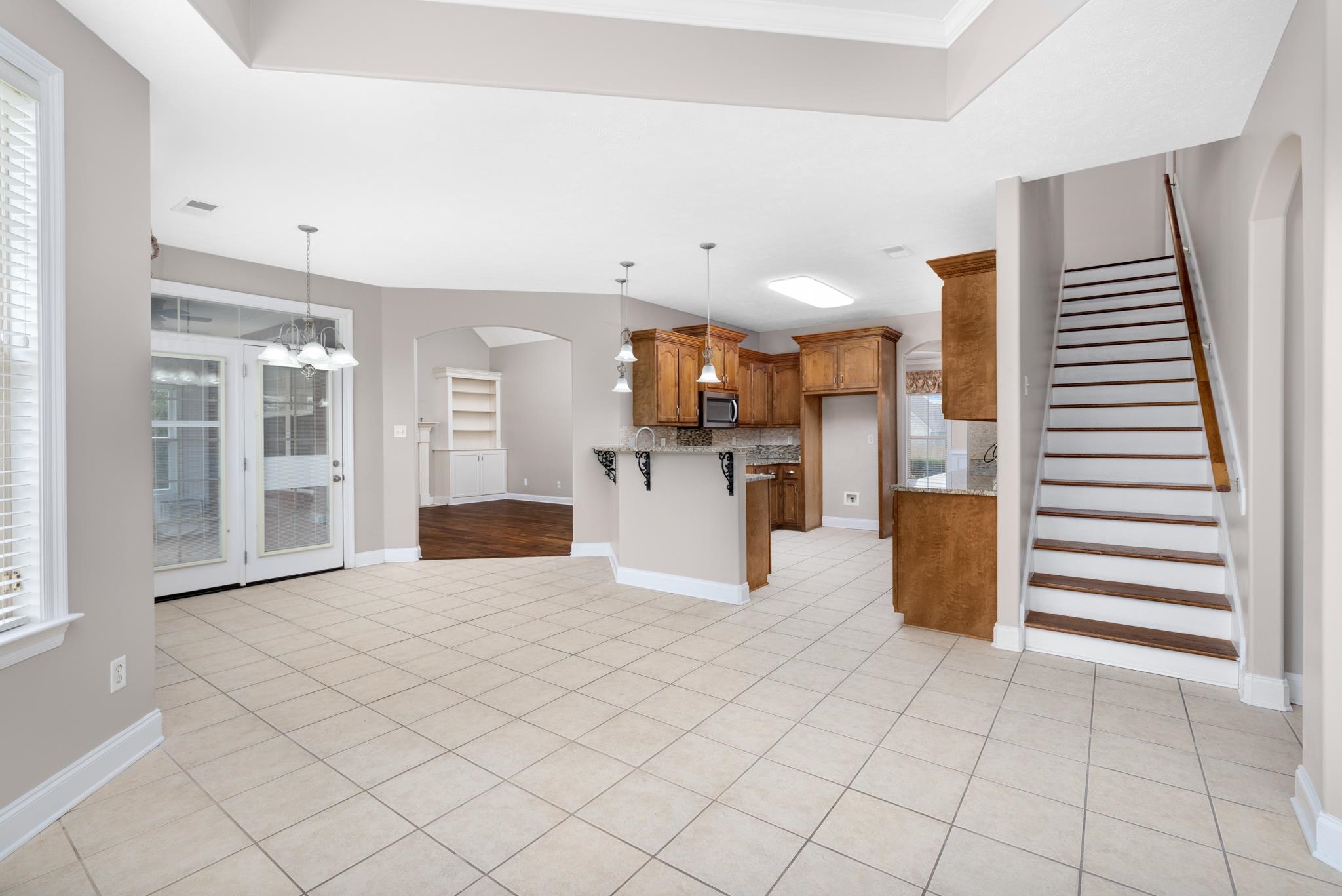 33 Ward Lane Atoka, TN 38004 - Photo 8 of 29 a view of a kitchen with furniture and wooden floor