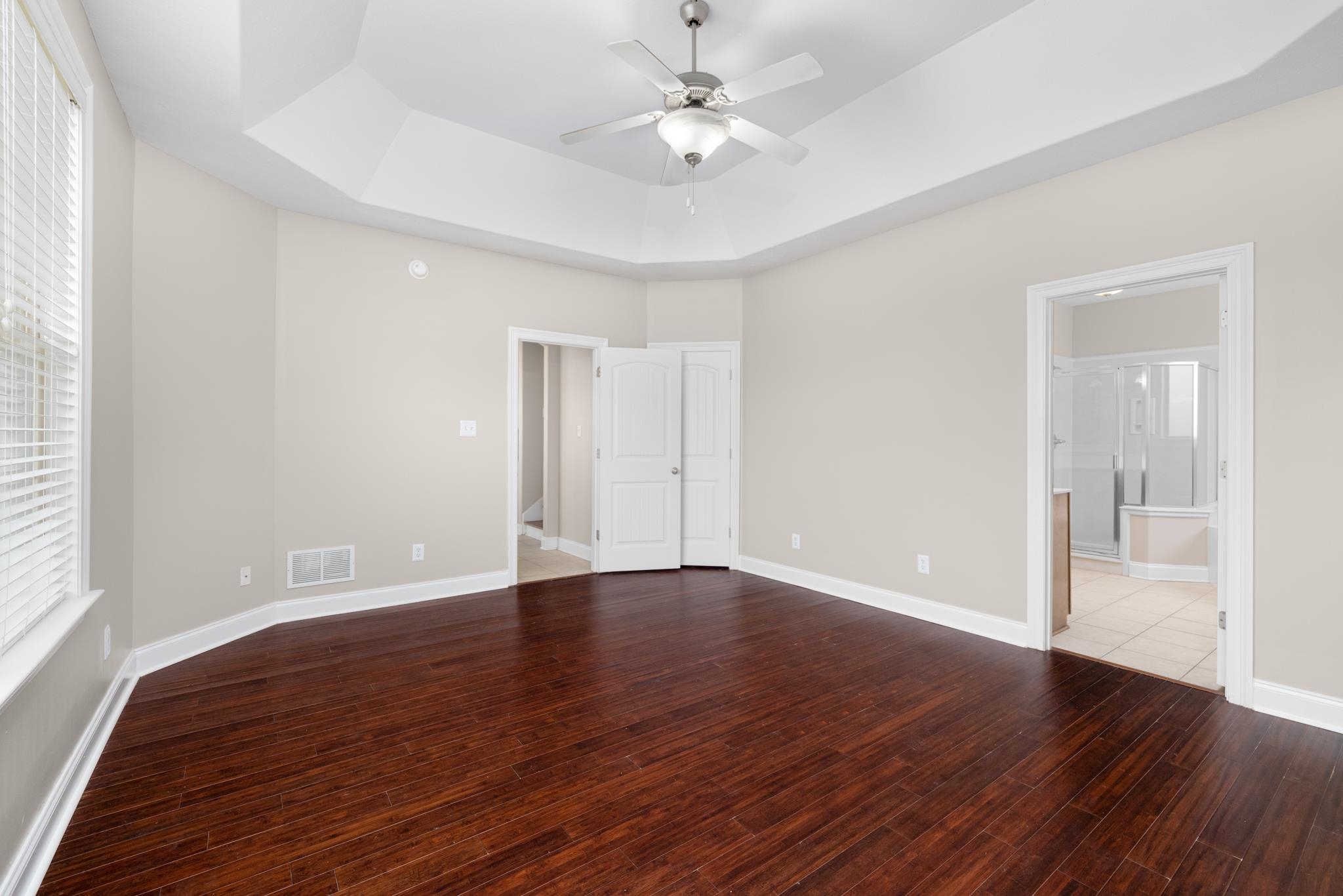 33 Ward Lane Atoka, TN 38004 - Photo 10 of 29 wooden floor in an empty room with a window