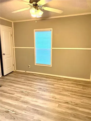 a bathroom with a toilet a sink and bathtub