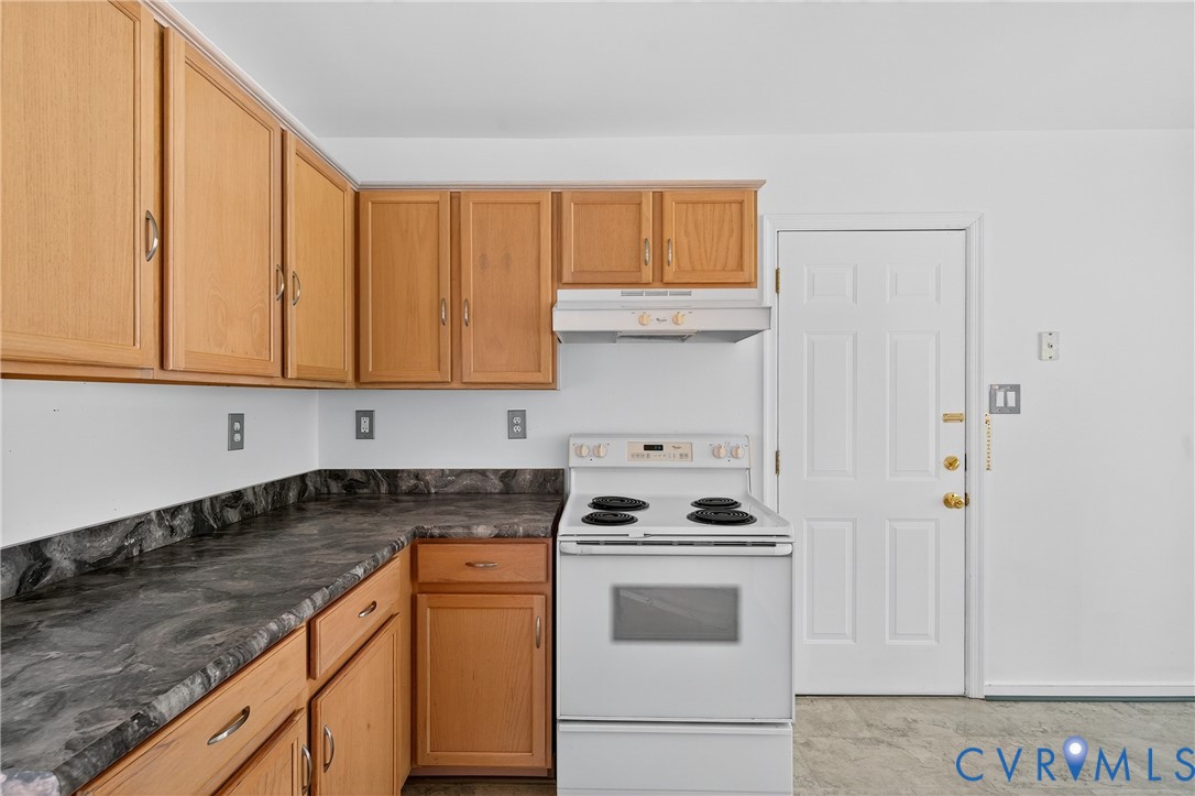 6125 Waterman Place Chesterfield, VA 23832 - Photo 12 of 45 a kitchen with granite countertop cabinets stainless steel appliances and sink