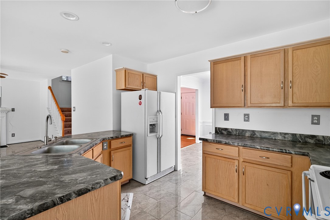 6125 Waterman Place Chesterfield, VA 23832 - Photo 13 of 45 a kitchen with stainless steel appliances granite countertop a refrigerator and a stove top oven