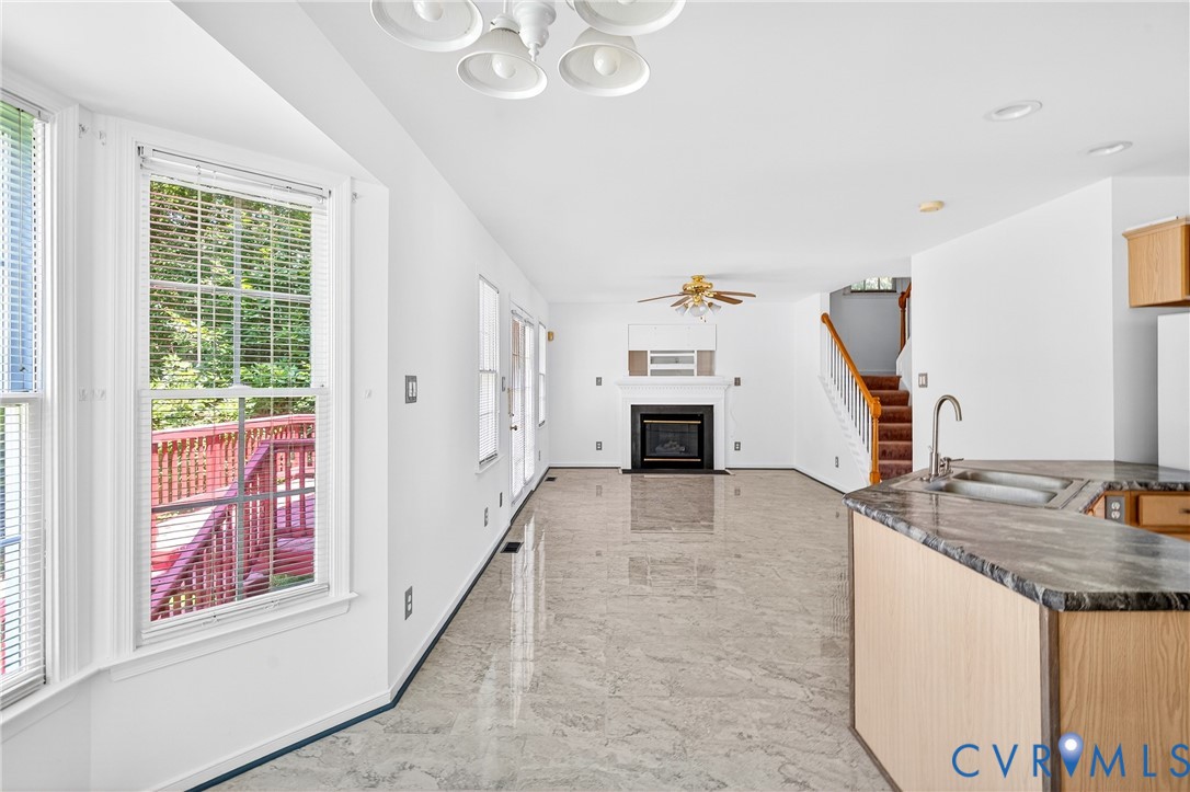 6125 Waterman Place Chesterfield, VA 23832 - Photo 14 of 45 Kitchen with a fireplace with flush hearth, light