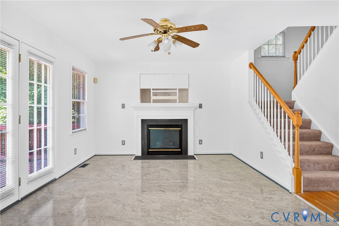 6125 Waterman Place Chesterfield, VA 23832 - Photo 17 of 45 Unfurnished living room with a fireplace with flus