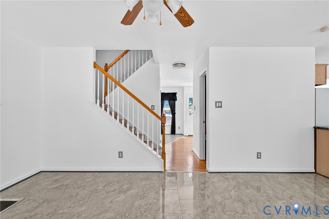 6125 Waterman Place Chesterfield, VA 23832 - Photo 18 of 45 a view of entryway and hall with wooden floor
