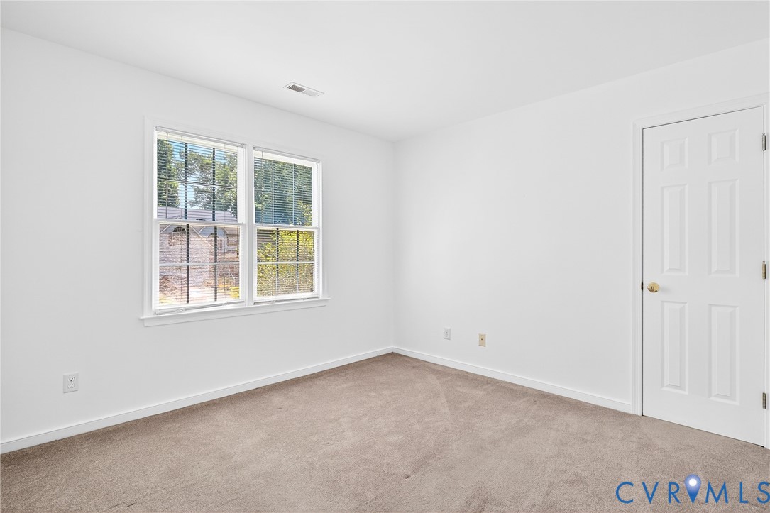 6125 Waterman Place Chesterfield, VA 23832 - Photo 21 of 45 an empty room with a window