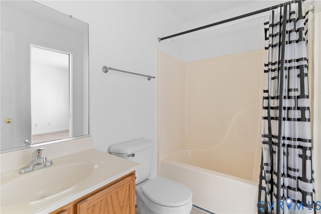 6125 Waterman Place Chesterfield, VA 23832 - Photo 23 of 45 a bathroom with a sink a toilet and shower