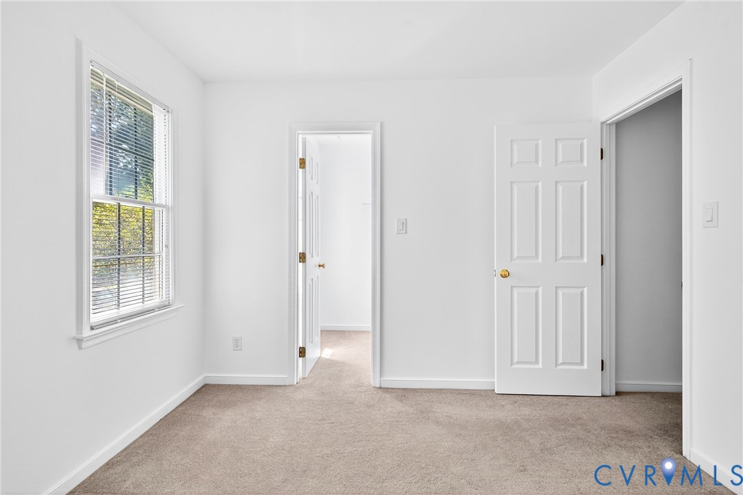 6125 Waterman Place Chesterfield, VA 23832 - Photo 29 of 45 Unfurnished bedroom featuring light carpet and bas