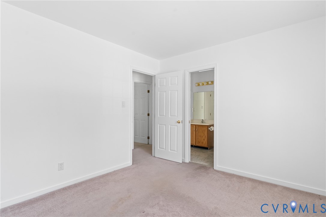 6125 Waterman Place Chesterfield, VA 23832 - Photo 30 of 45 Unfurnished bedroom with light colored carpet and