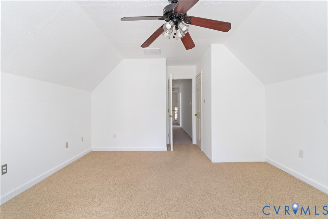 6125 Waterman Place Chesterfield, VA 23832 - Photo 31 of 45 Bonus room with vaulted ceiling, carpet floors, an