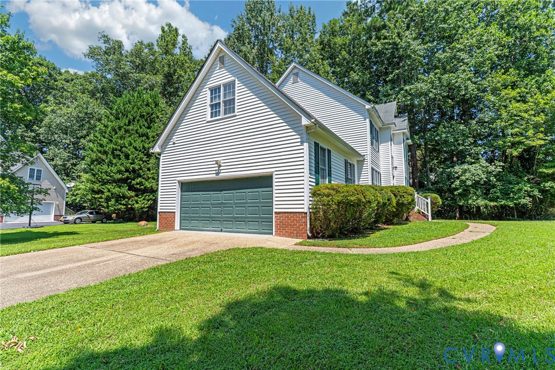 6125 Waterman Place Chesterfield, VA 23832 - Photo 41 of 45 a view of a house with a yard and potted plants