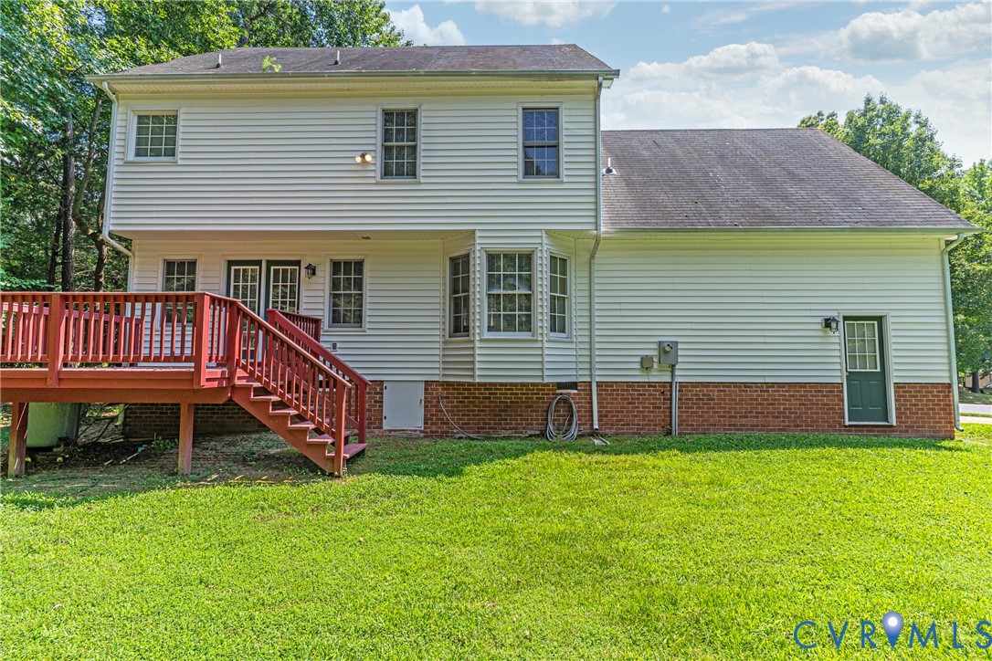 6125 Waterman Place Chesterfield, VA 23832 - Photo 44 of 45 a front view of a house with a yard and deck