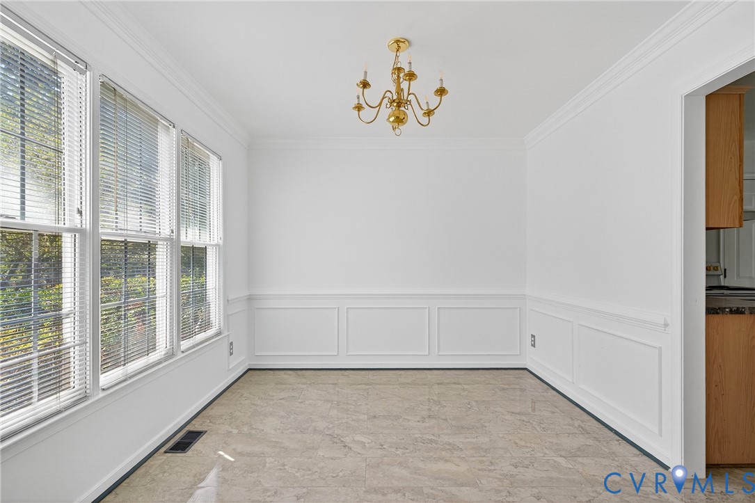 6125 Waterman Place Chesterfield, VA 23832 - Photo 6 of 45 a view of an empty room with a window