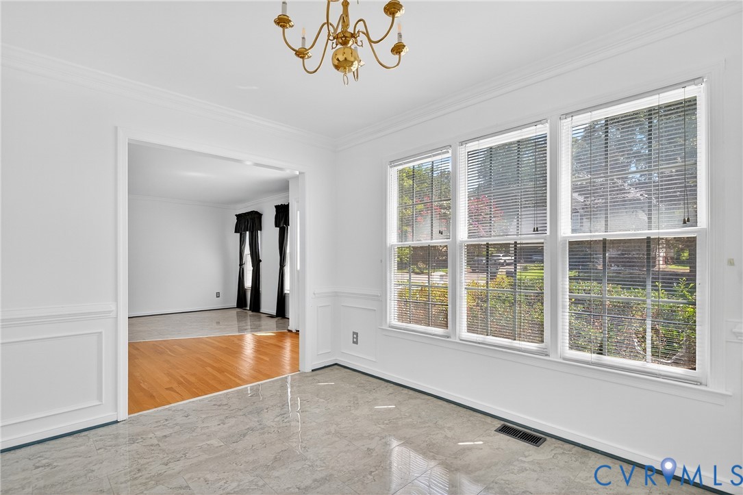 6125 Waterman Place Chesterfield, VA 23832 - Photo 8 of 45 Unfurnished dining area featuring a chandelier, or