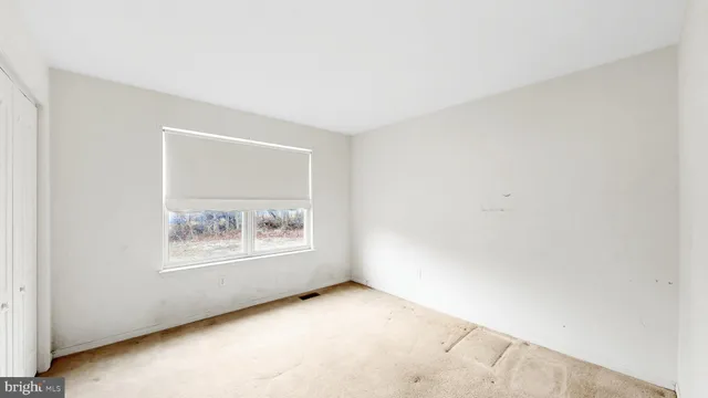an empty room with a window