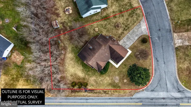 an aerial view of house with outdoor space