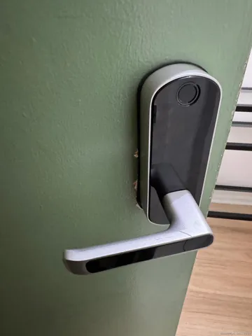 a view of a room with window and wooden floor