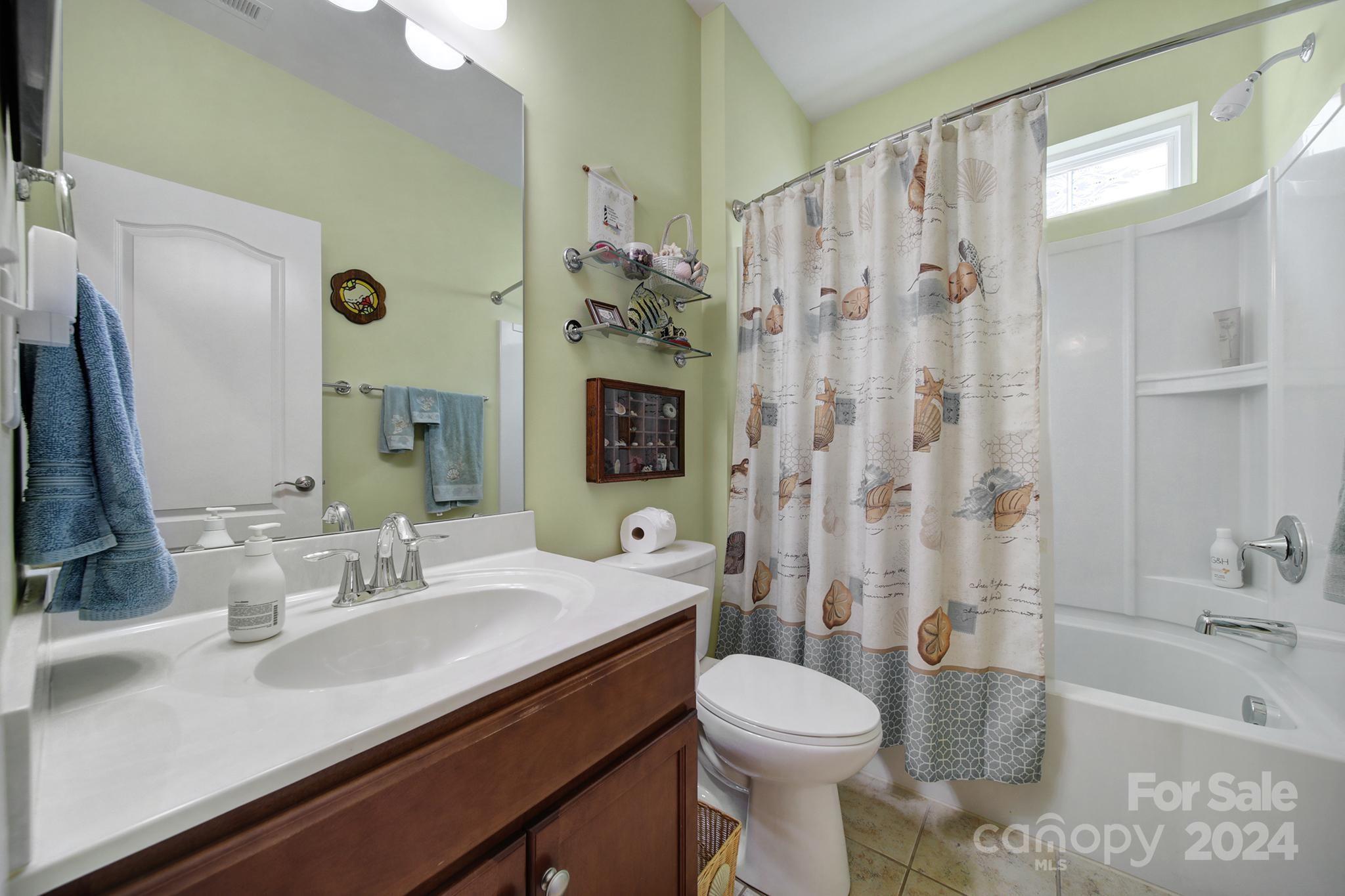 4362 Perth Road Fort Mill, SC 29707 - Photo 23 of 34 a bathroom with a sink a toilet and shower