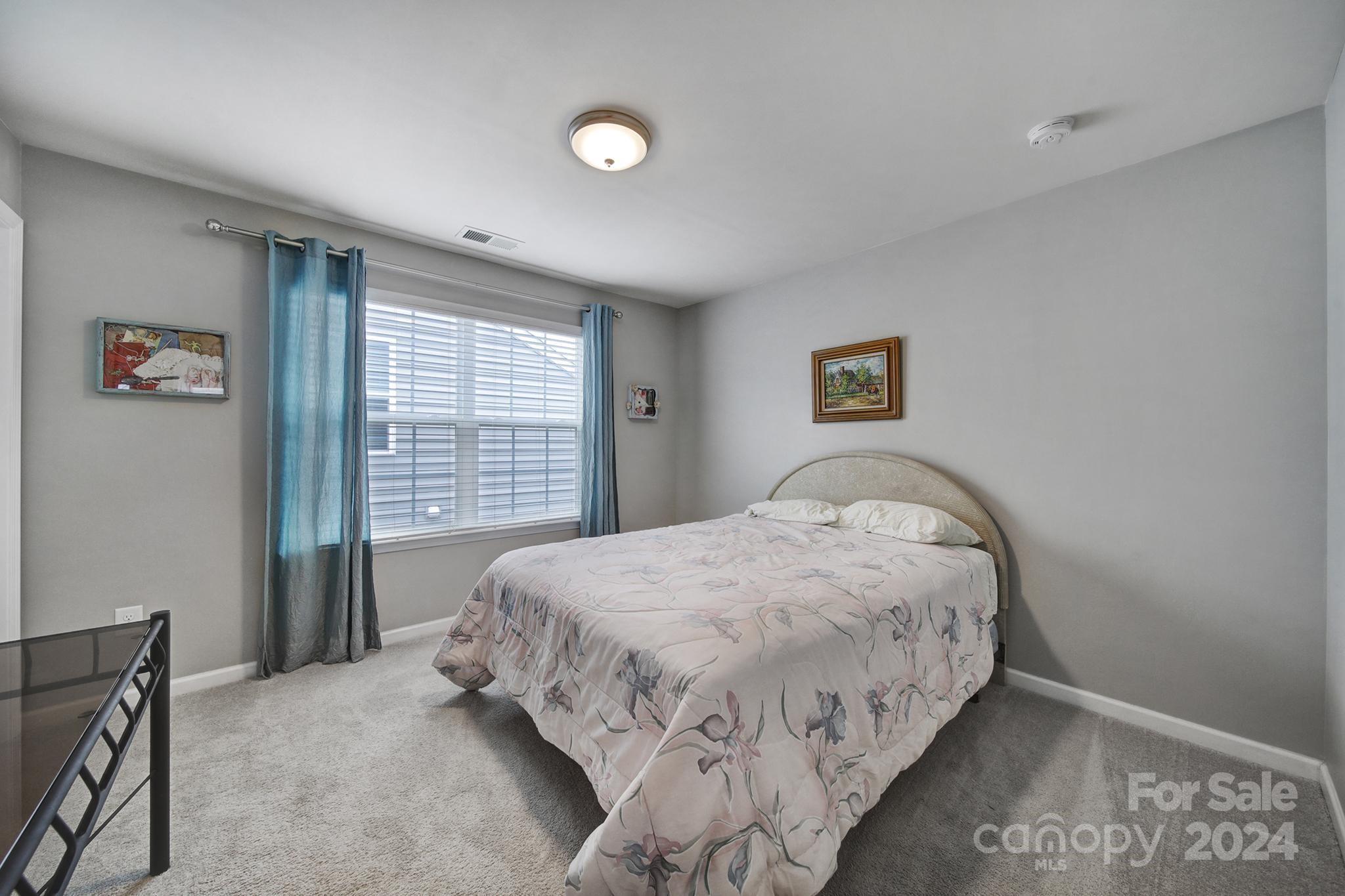 4362 Perth Road Fort Mill, SC 29707 - Photo 29 of 34 a bedroom with a bed and a window