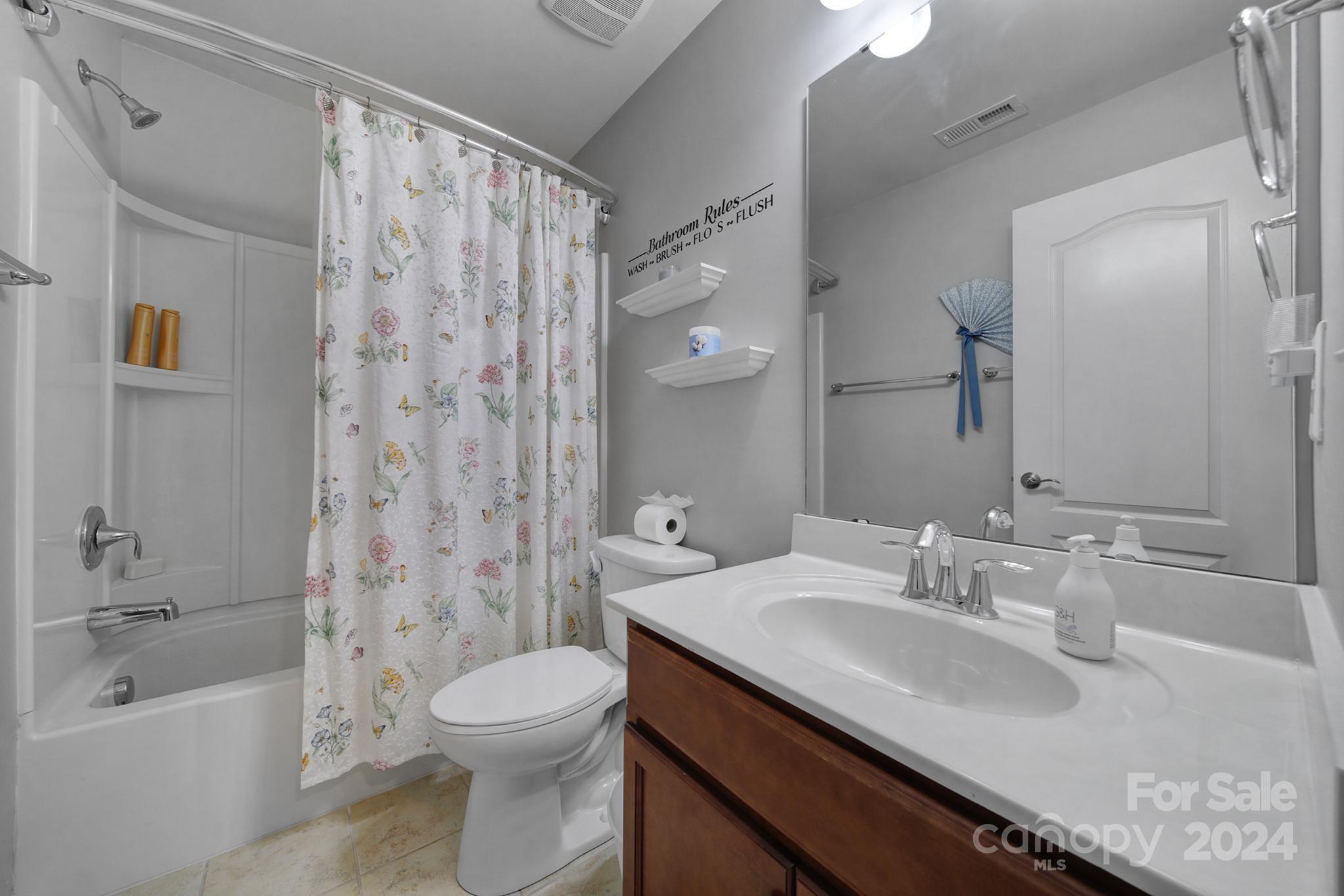 4362 Perth Road Fort Mill, SC 29707 - Photo 30 of 34 a bathroom with a sink a toilet and shower