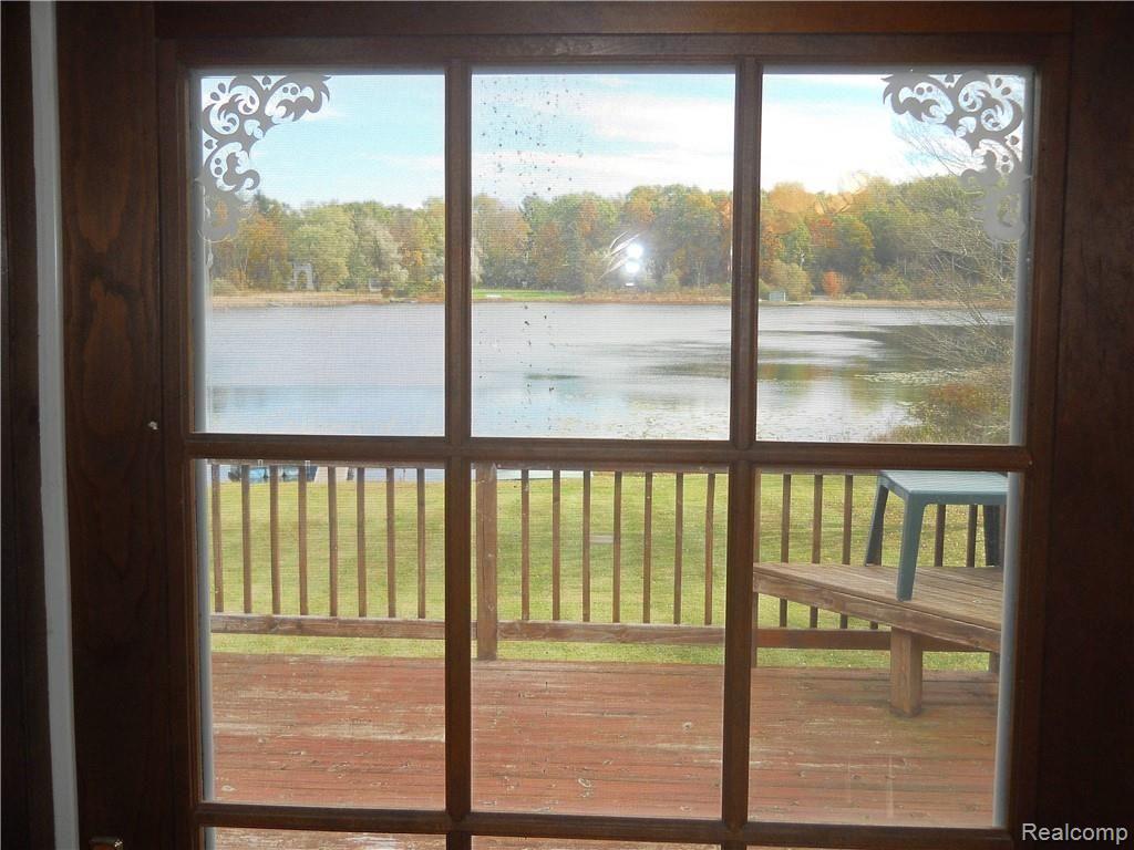 4237 Rurik Drive Howell, MI 48843 - Photo 11 of 37 enjoy lake views from dining room